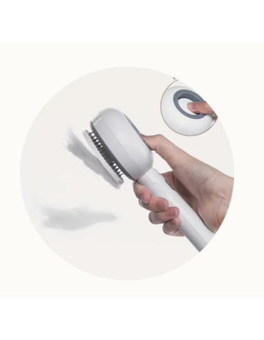 Spazzy Spazzola Portatile Con Nebulizzatore  a Freddo bianca . Toelettatura per cani e gatti.